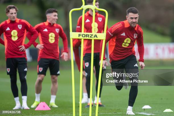 Aaron Ramsey warms up during the Wales Football Training Session at The Vale Resort on March 20, 2024 in Hensol, Wales.