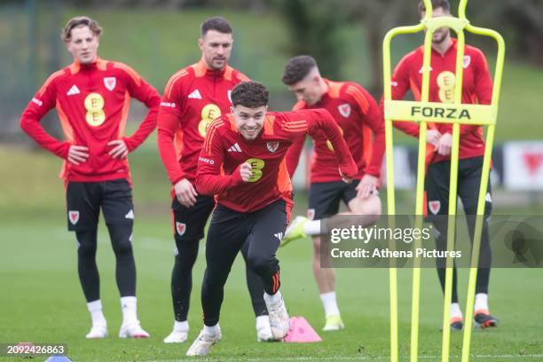 Neco Williams warms up during the Wales Football Training Session at The Vale Resort on March 20, 2024 in Hensol, Wales.