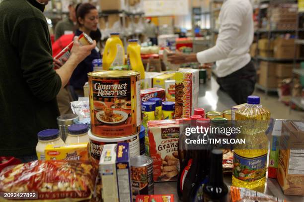 Food donations increase during the holidays for area food banks 21 November, 2007 at Food & Friends in Washington, DC. Food & Friends prepares,...