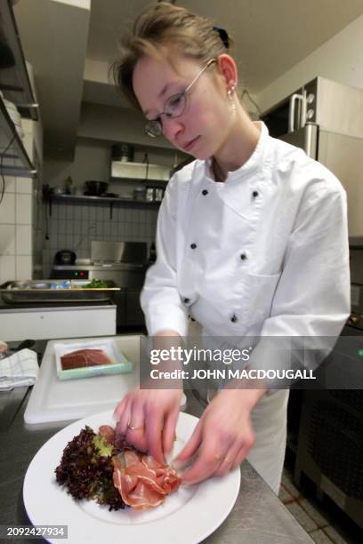 Claudia, who has had a bout with anorexia, prepares breakfast in the "Sehnsucht" kitchen , Berlin's first restaurant designed for people suffering...