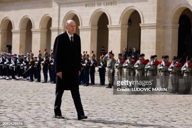 French politician Charles de Gaulle walks as he attends a "national tribute" ceremony to his father, late French politician and admiral, Philippe de...