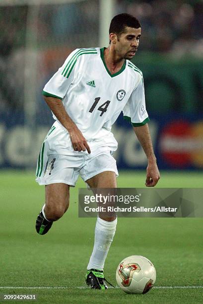 June 11: Abdulaziz Khathran of Saudi Arabia on the ball during the FIFA World Cup Finals 2002 Group E match between Saudi Arabia and Republic Of...