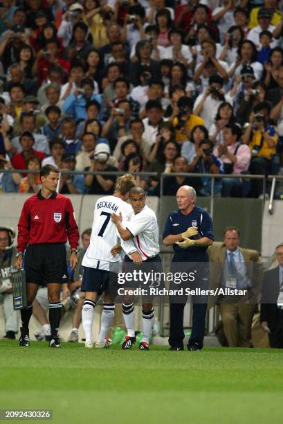 June 2: David Beckham of England is substituted by Kieron Dyer of England during the FIFA World Cup Finals 2002 Group F match between England and...