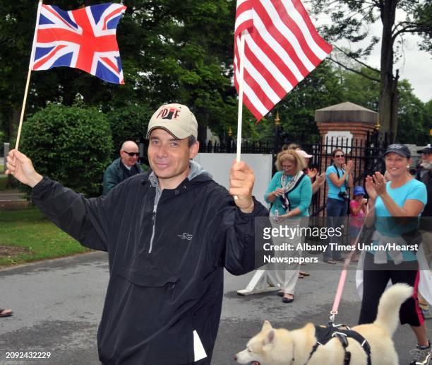 Horse racing fan Jeremy Edge of Great Britain arrives at Saratoga Race Course Friday June 24 after walking from Belmont Park to raise money for the...
