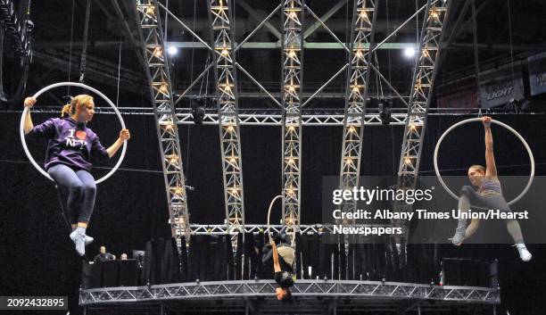 Aerial artists, from left, Danila Bim, Meaghan Wegg and Lisa Skinner rehearse "Aerial Hoops" as Cirque du Soleil prepares for the Quidam performances...