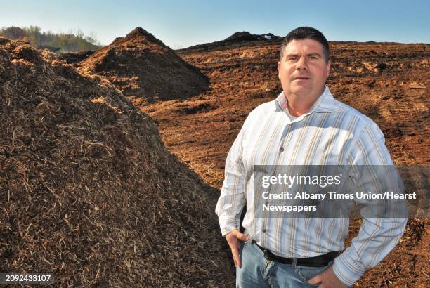 Sean Gallivan amid the mountains of pine bark mulch at Gallivan Companies in Troy Wednesday Nov. 2, 2011.