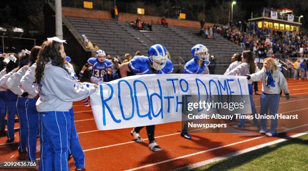 Shaker blue bisons take the field for their Class AA state semifinal game against New Rochelle at Dietz Stadium in Kingston Saturday Nov. 17, 2012.