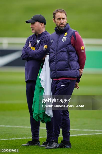 Gareth Southgate the head coach / manager of England and Steve Holland the assistant manager of England during England training session at St Georges...