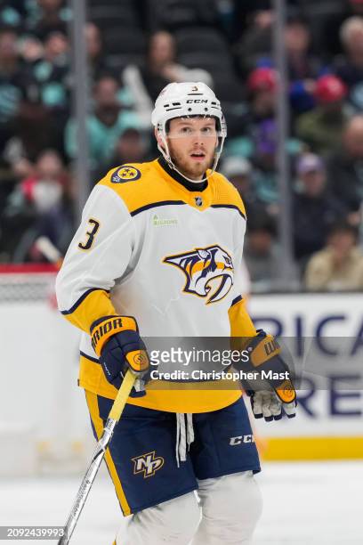 Jeremy Lauzon of the Nashville Predators looks on during the second period of a game against the Seattle Kraken at Climate Pledge Arena on March 16,...