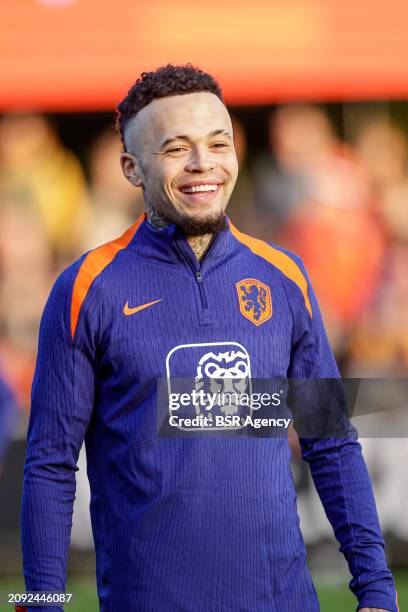 Quilindschy Hartman of The Netherlands laughing during the Training session of the Netherlands National Football Team at KNVB Campus on March 18,...