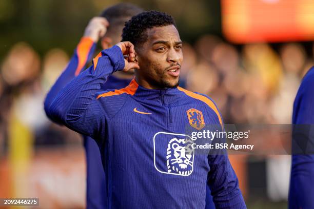 Quinten Timber of The Netherlands looks up during the Training session of the Netherlands National Football Team at KNVB Campus on March 18, 2024 in...