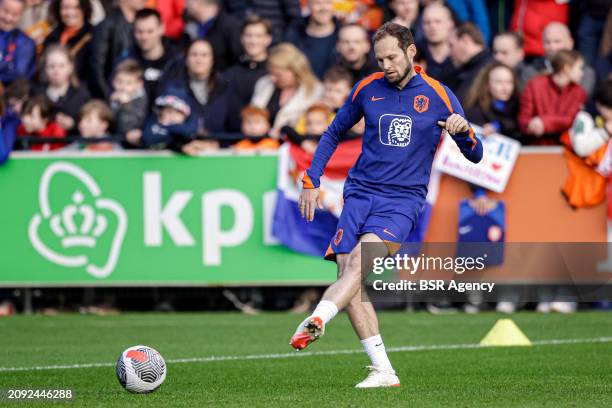 Daley Blind of The Netherlands makes a pass during the Training session of the Netherlands National Football Team at KNVB Campus on March 18, 2024 in...