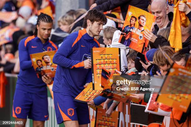 Marten de Roon of The Netherlands signing autographs during the Training session of the Netherlands National Football Team at KNVB Campus on March...