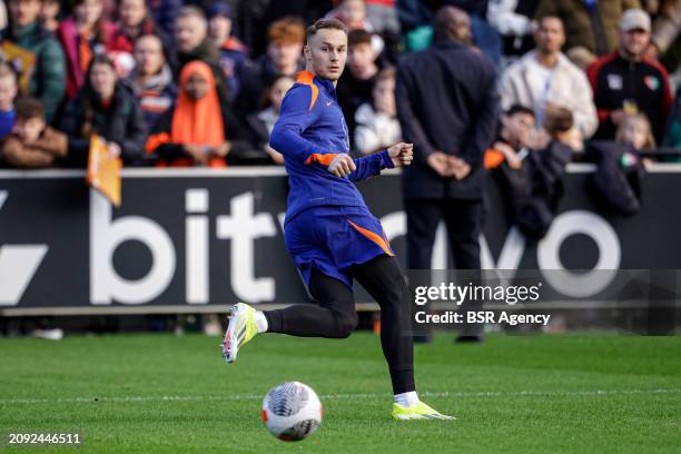 Teun Koopmeiners of The Netherlands looks up during the Training session of the Netherlands National Football Team at KNVB Campus on March 18, 2024...