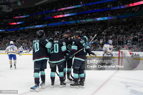The Seattle Kraken celebrate a goal against the Buffalo Sabres during the first period of a game at Climate Pledge Arena on March 18, 2024 in...