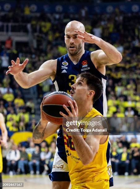 Nicolas Laprovittola in action with Nick Calathes, #33 of Fenerbahce Beko Istanbul during the Turkish Airlines EuroLeague Regular Season Round 30...