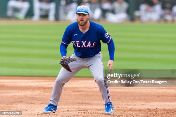 Sam HuffGLENDALE, AZ Jared Walsh of the Texas Rangers gets set during a spring training game against the Chicago White Sox at Camelback Ranch on...