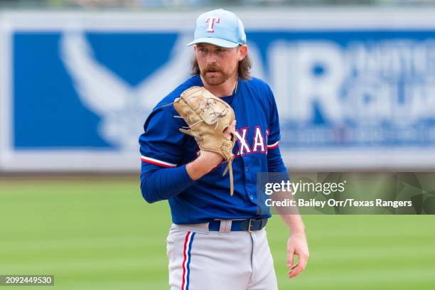 Robby Ahlstrom of the Texas Rangers pitches during a spring training game against the Chicago White Sox at Camelback Ranch on February 26, 2024 in...