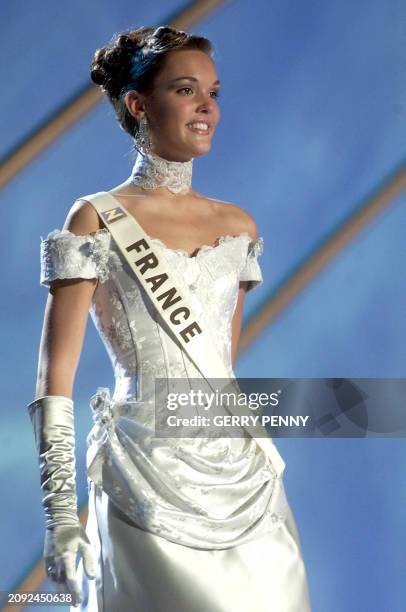 Year old Karine Meier of France enter the stage contending in the Miss World final in the millenium Dome in London, 30 November 2000 .