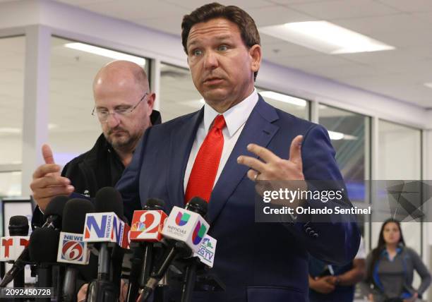 Florida Gov. Ron DeSantis speaks at the Orlando Sanford International Airport on Wednesday, March 20, 2024. DeSantis was at the airport to announce...