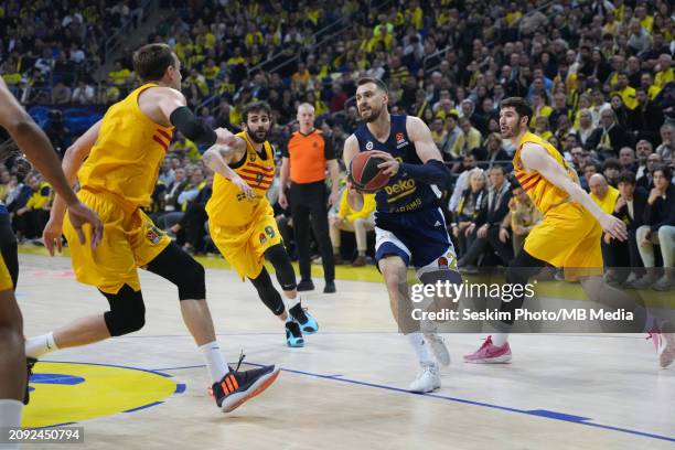 Marko Guduric of Fenerbahce Beko and Jan Vesely , Dario Brizuela , Ricky Rubio of FC Barcelona in action during the Turkish Airlines EuroLeague...