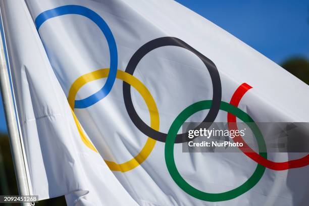 Olympic symbols on a flag at Panathenaic Stadium, the site of the first modern Olympic games in 1896, in Athens, Greece on March 14th, 2024.