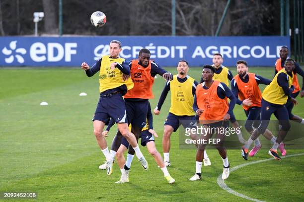 Aurelien TCHOUAMENI - 14 Adrien RABIOT - 04 Dayot UPAMECANO during the training session of France team at Centre National du Football on March 20,...