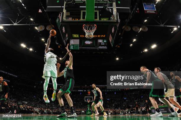 Patrick Beverley of the Milwaukee Bucks drives to the basket during the game against the Boston Celtics on March 20, 2024 at the TD Garden in Boston,...