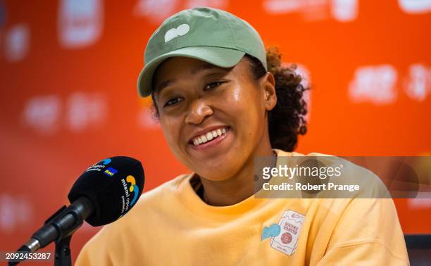 Naomi Osaka of Japan talks to the media after defeating Elisabetta Cocciaretto of Italy in the first round on Day 5 of the Miami Open Presented by...