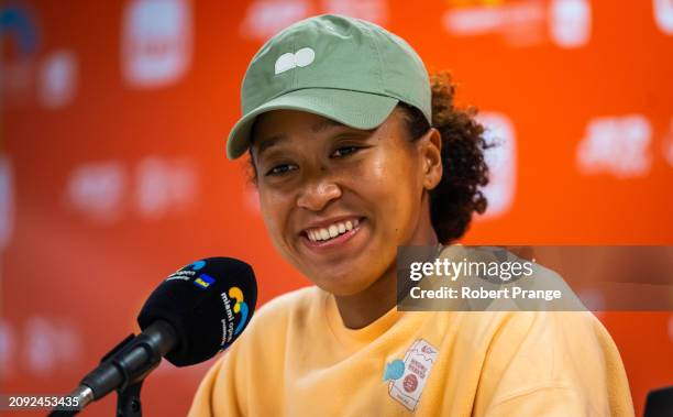 Naomi Osaka of Japan talks to the media after defeating Elisabetta Cocciaretto of Italy in the first round on Day 5 of the Miami Open Presented by...