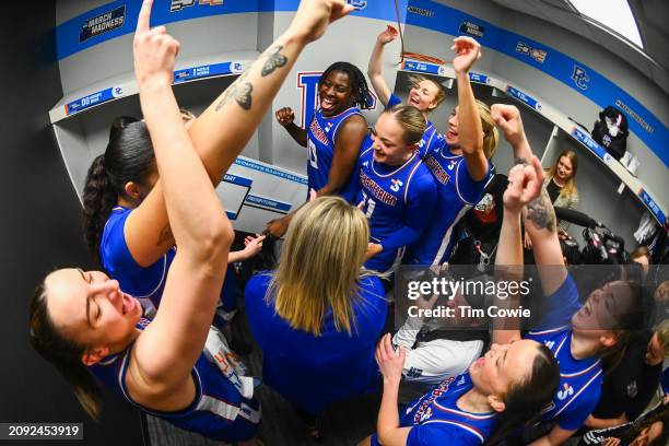 Presbyterian Blue Hose players celebrate following their win over the Sacred Heart Pioneers during the First Four round of the 2024 NCAA Women's...