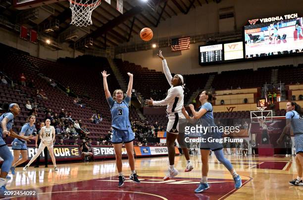 Jordyn Oliver of the Vanderbilt Commodores shoots in the first half against Cecelia Collins of the Columbia Lions during the First Four round of the...