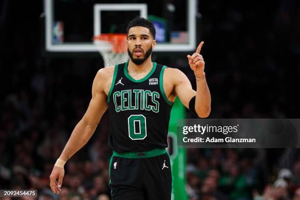 Jayson Tatum of the Boston Celtics looks on during a game against the Milwaukee Bucks at TD Garden on March 20, 2024 in Boston, Massachusetts. NOTE...