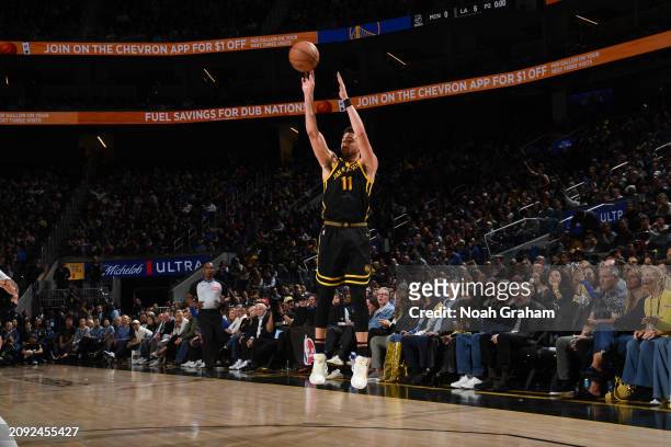 Klay Thompson of the Golden State Warriors shoots the ball during the game against the Memphis Grizzlies on March 20, 2024 at Chase Center in San...
