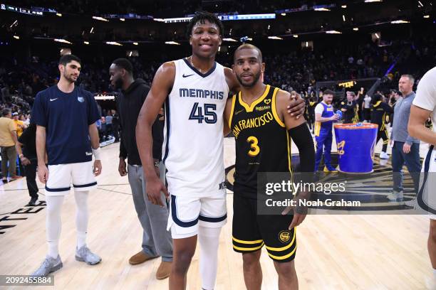 Jackson of the Memphis Grizzlies and Chris Paul of the Golden State Warriors pose for a photo after the game on March 20, 2024 at Chase Center in San...