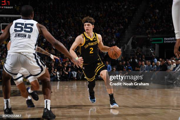Brandin Podziemski of the Golden State Warriors dribbles the ball during the game against the Memphis Grizzlies on March 20, 2024 at Chase Center in...