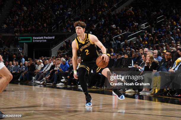 Brandin Podziemski of the Golden State Warriors dribbles the ball during the game against the Memphis Grizzlies on March 20, 2024 at Chase Center in...