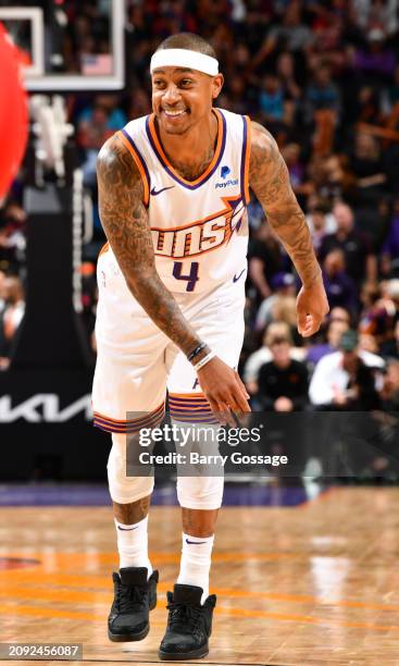 Isaiah Thomas of the Phoenix Suns smiles during the game against the Philadelphia 76ers on March 20, 2024 at Footprint Center in Phoenix, Arizona....