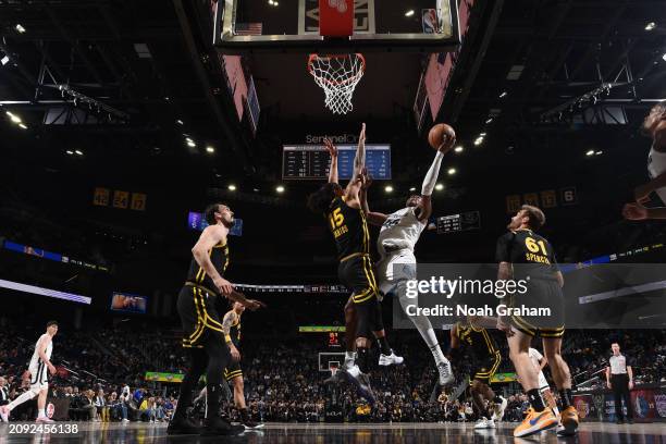 Jackson of the Memphis Grizzlies drives to the basket during the game against the Golden State Warriors on March 20, 2024 at Chase Center in San...