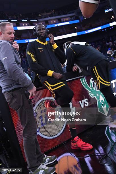 Draymond Green of the Golden State Warriors talks to the media after the game against the Memphis Grizzlies on March 20, 2024 at Chase Center in San...