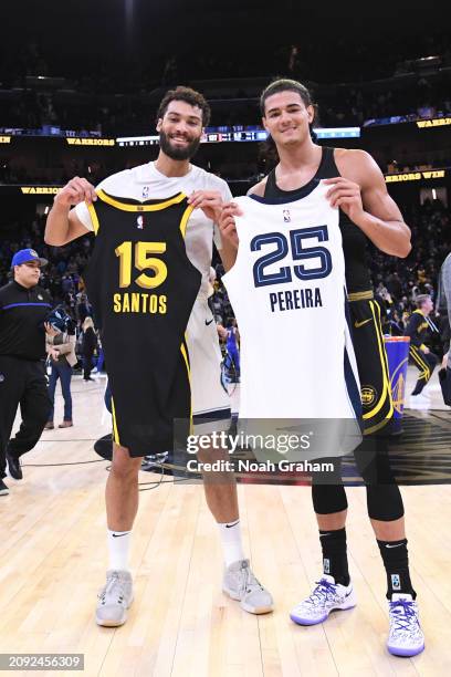 Gui Santos of the Golden State Warriors and Maozinha Pereira of the Memphis Grizzlies exchange jerseys after the game on March 20, 2024 at Chase...