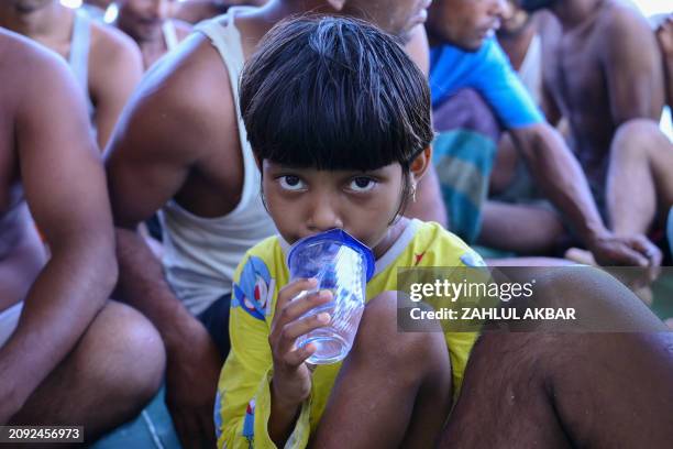 Rohingya refugee looks on aboard a National Search and Rescue Agency vessel after they were rescued from their capsized boat in waters some 16...