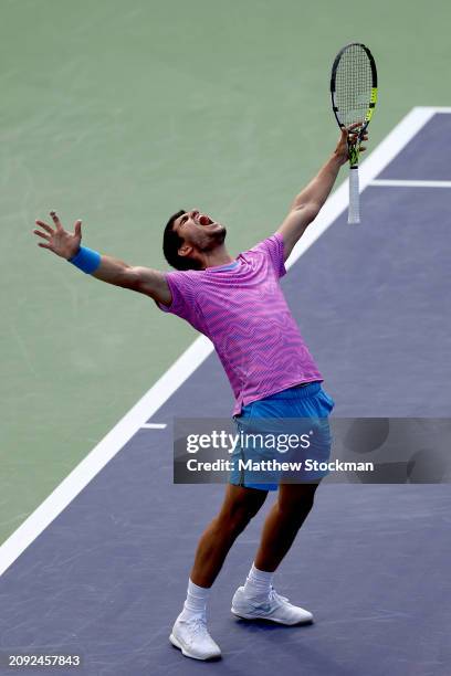 Carlos Alcaraz of Spain celebrates match point against Daniil Medvedev of Russia during the Men's Final of the BNP Paribas Open at Indian Wells...