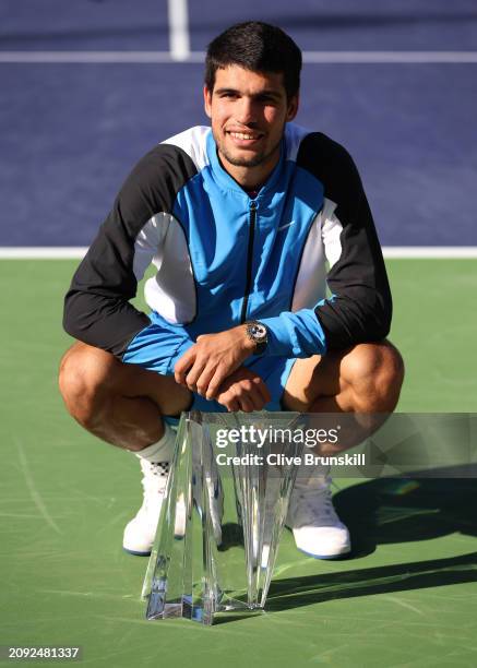 Carlos Alcaraz of Spain with his winners trophy after his straight sets victory against Daniil Medvedev in the Men's Final during the BNP Paribas...