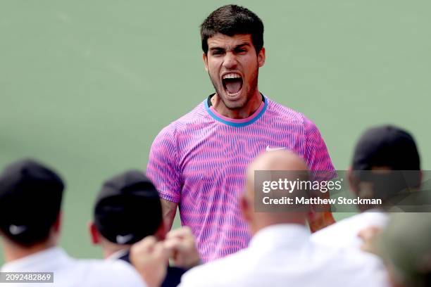 Carlos Alcaraz of Spain celebrates celebrates to his team after defeating Daniil Medvedev of Russia during the Men's Final of the BNP Paribas Open at...