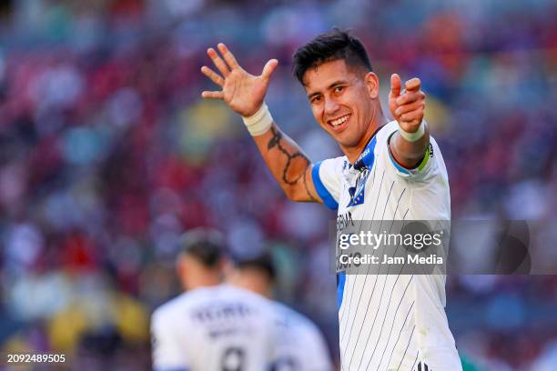 Maximiliano Meza of Monterrey celebrates after scoring the team's first goal during the 12th round match between Atlas and Monterrey as part of the...