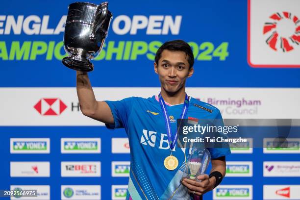 Gold medalist Jonatan Christie of Indonesia poses during medal ceremony for the Men's Singles Final match against Anthony Sinisuka Ginting of...