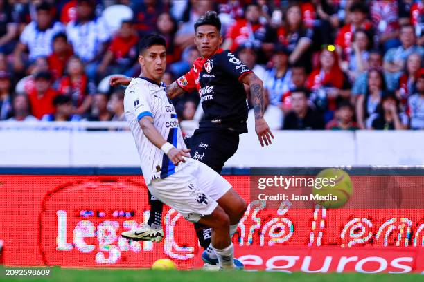 Maximiliano Meza of Monterrey fights for the ball with Raymundo Fulgencio of Atlas during the 12th round match between Atlas and Monterrey as part of...