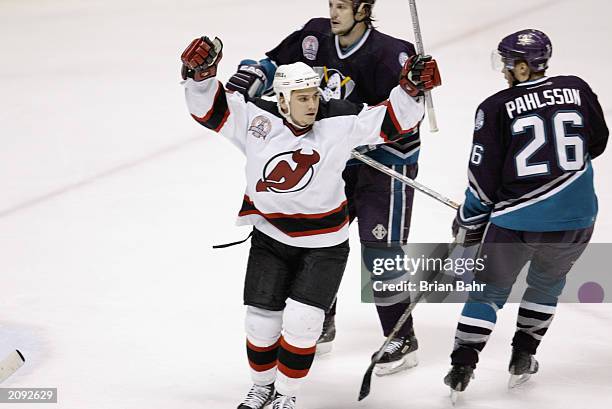 Jamie Langenbrunner of the New Jersey Devils celebrates after scoring a goal against the Mighty Ducks of Anaheim in game five of the 2003 Stanley Cup...