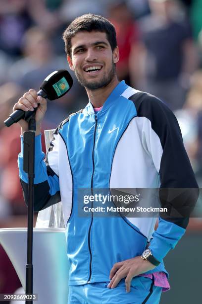 Carlos Alcaraz of Spain address the crowd at the trophy ceremony after defeating Daniil Medvedev of Russia during the Men's Final of the BNP Paribas...